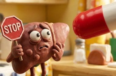 Image of Tylenol for a hangover showing a cartoon liver holding a stop sign.