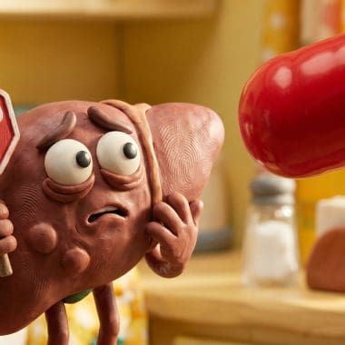 Image of Tylenol for a hangover showing a cartoon liver holding a stop sign.