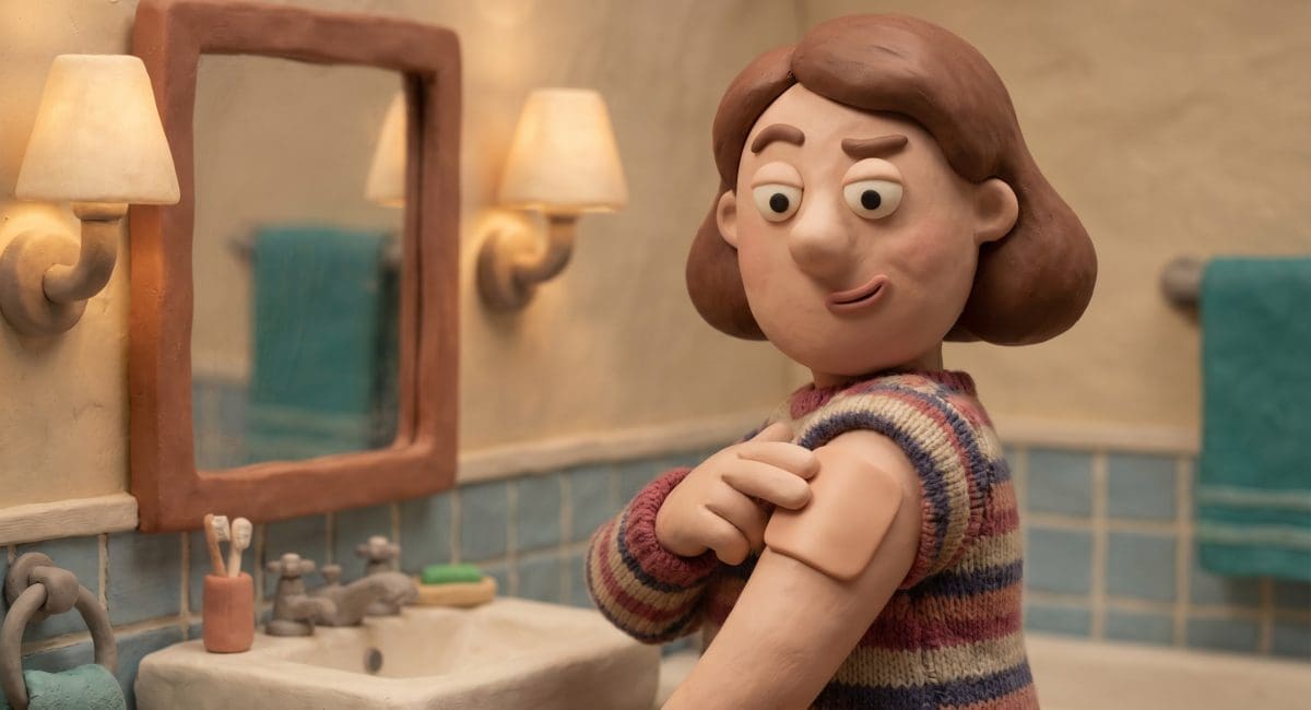 Image of a hangover patch — a claymation woman skeptically applying a small square patch to her arm before a night out.